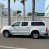 Location Toyota Hilux Blanche – 60.000 F/ Jour – Chauffeur dédié – Moteur Diesel – 5 Places – Tarif Dégressif - Image 4